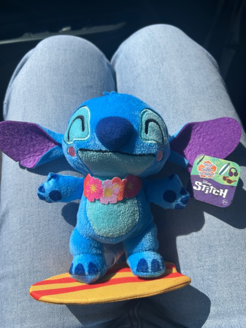 Disney Stitch Plush with surfboard and lei